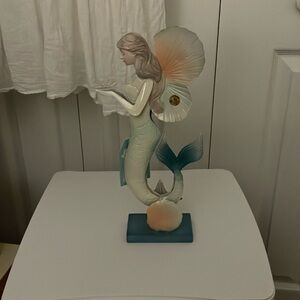 Mermaid metal statue